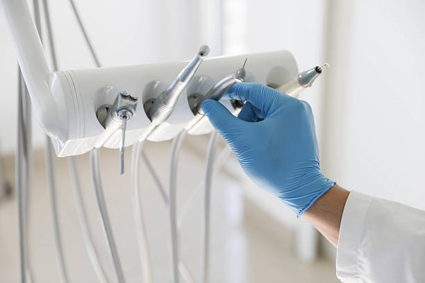 Professional Tooth Extraction technician working in Broadlands, VA
